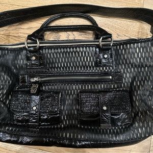 Leonello Borghi black perforated leather bag